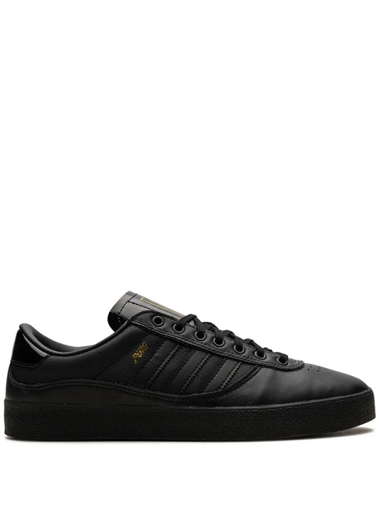adidas Puig Indoor Black Out Sneakers — Black — Size US M 6.5 - US W 8 — Front View